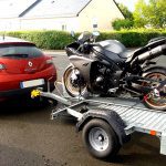 sangler moto sur remorque