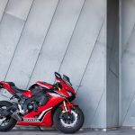 red and black sports bike